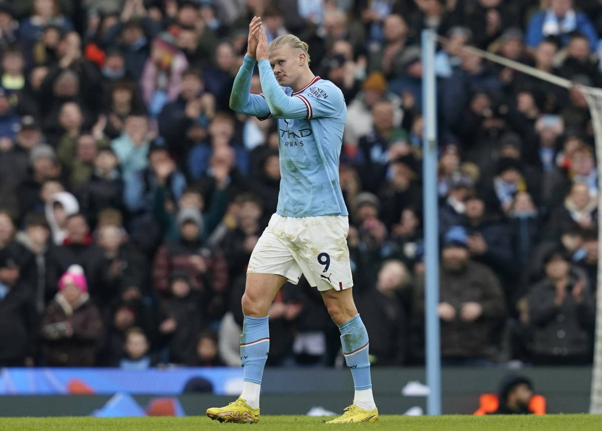 Erling Haaland pictured applauding his fans as he leaves the field after scoring a hat-trick for Manchester City against Wolves in January 2023